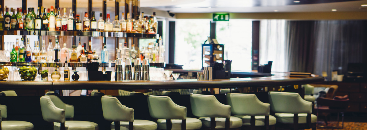 Sleek bar at Hilton London Syon Park, perfect for networking events and cocktail receptions.