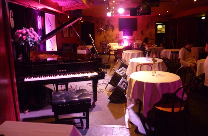 Private party setup with grand piano at 606 Club, ideal for music events and gatherings.