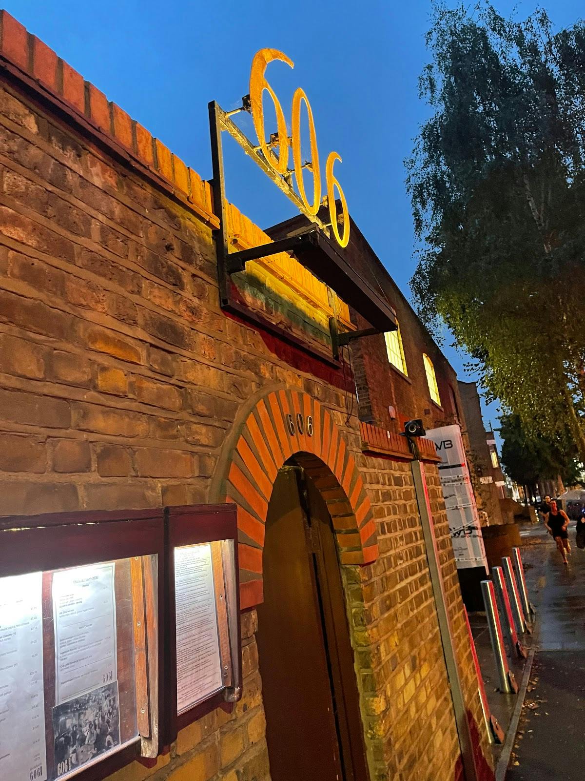 The 606 Club entrance with rustic stone facade, perfect for intimate events and gatherings.