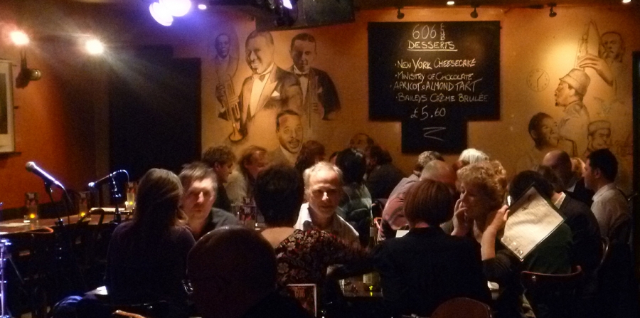 Vibrant 606 Club venue with warm lighting, ideal for networking and intimate events.