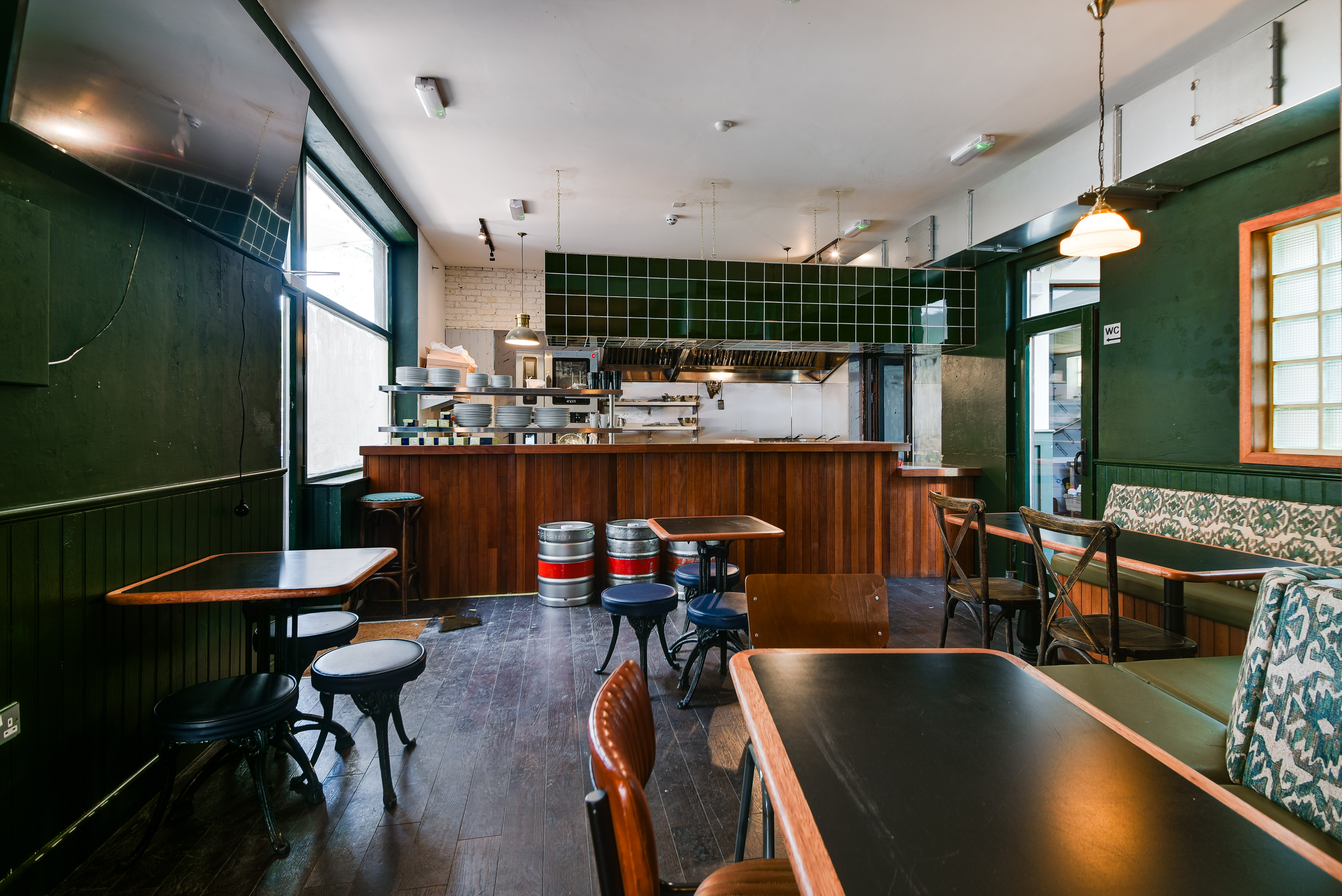 Cozy venue with warm wood accents, ideal for networking and casual events in Peckham.