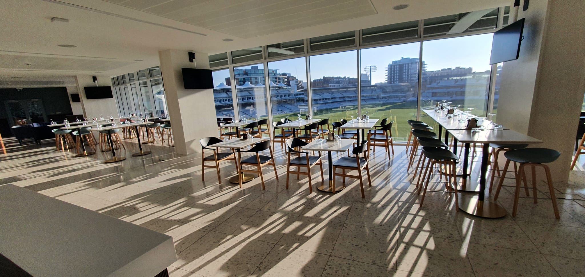 Modern event space at Lord's Cricket Ground with large windows for meetings and gatherings.