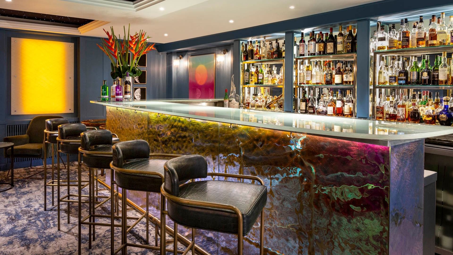 Stylish bar at The Capital Hotel, perfect for networking events and cocktail receptions.