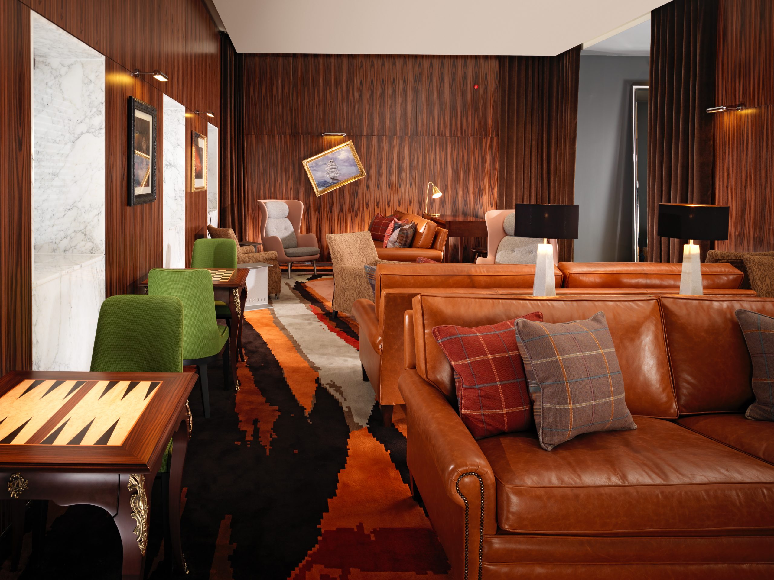 Stylish lounge at The Den, Millwall Holdings, ideal for networking events and meetings.