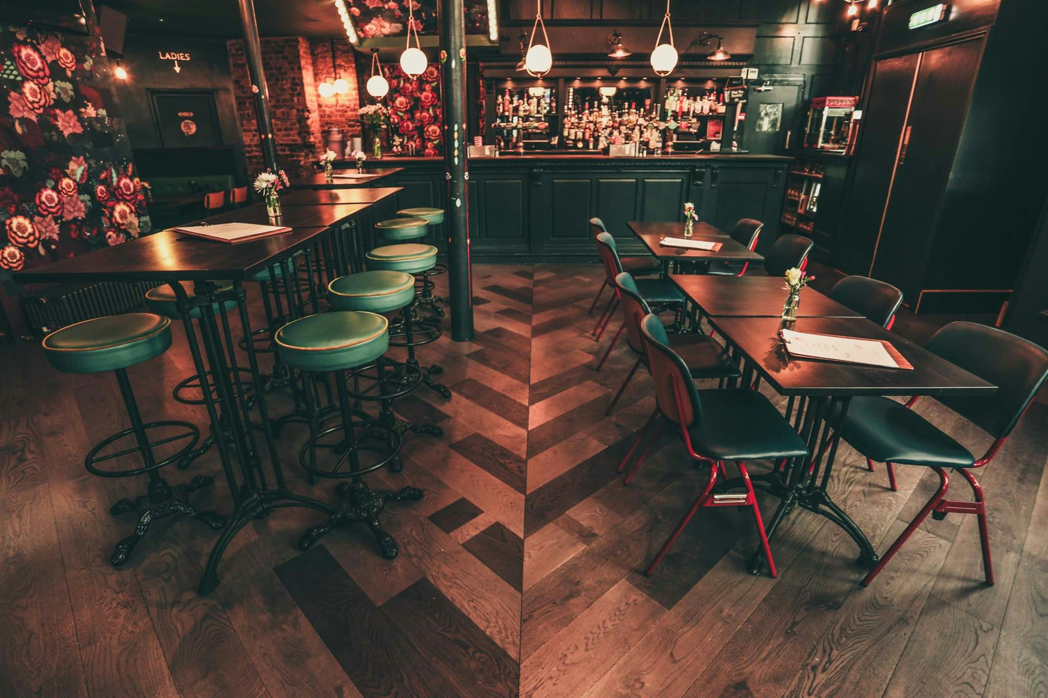 Stylish venue with colorful seating, ideal for networking events and intimate dinners.