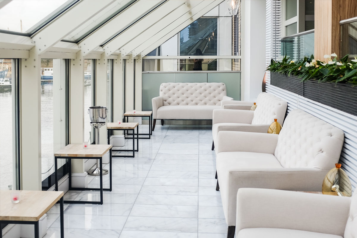 Stylish lounge area with plush sofas for networking events in Bella Cosa.