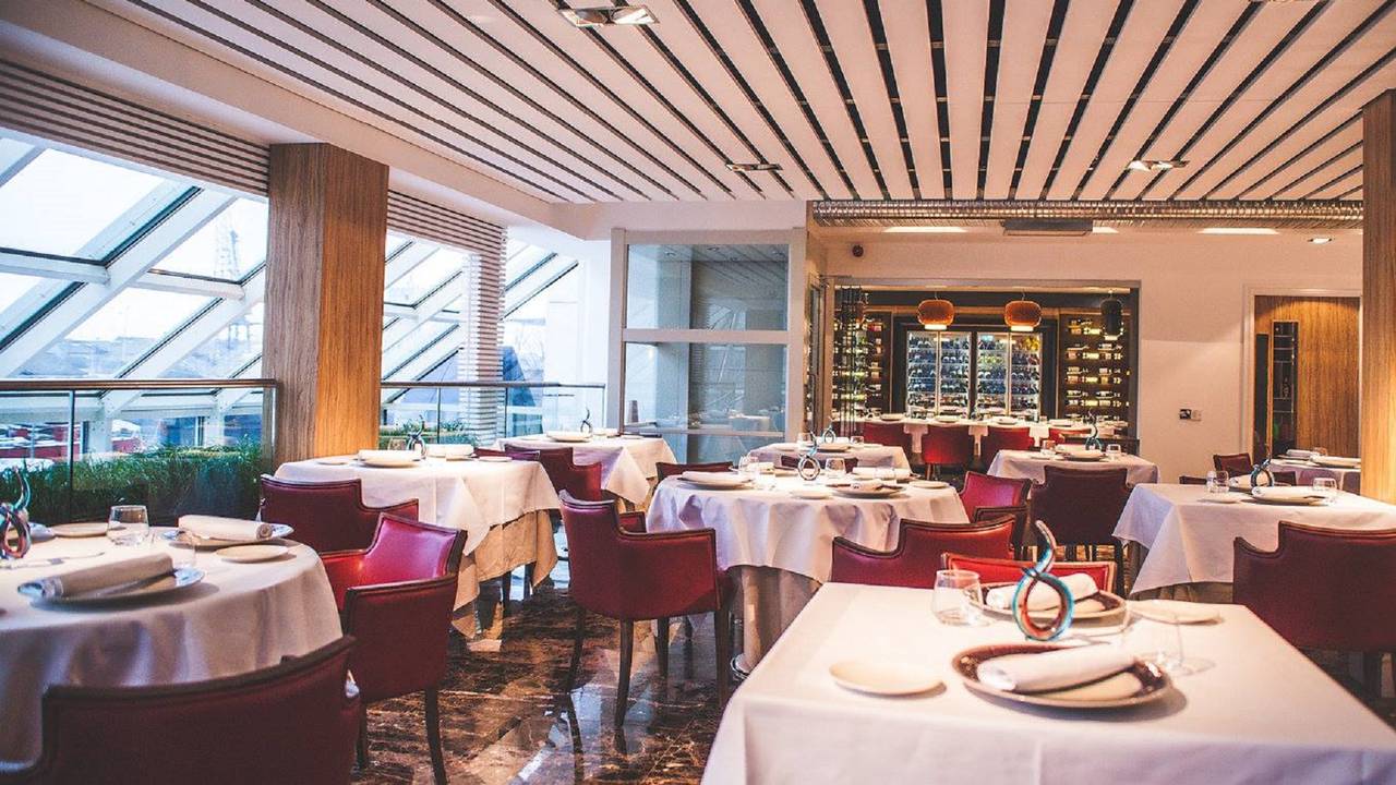 Sophisticated dining space with elegant decor for upscale events and corporate gatherings.