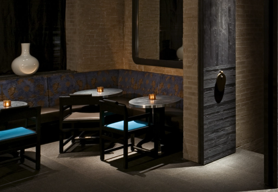 Intimate meeting space in Buddakan's Library, perfect for gatherings and events.