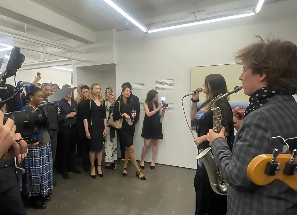 Vibrant networking event in Fitzrovia Gallery with live music and diverse attendees.