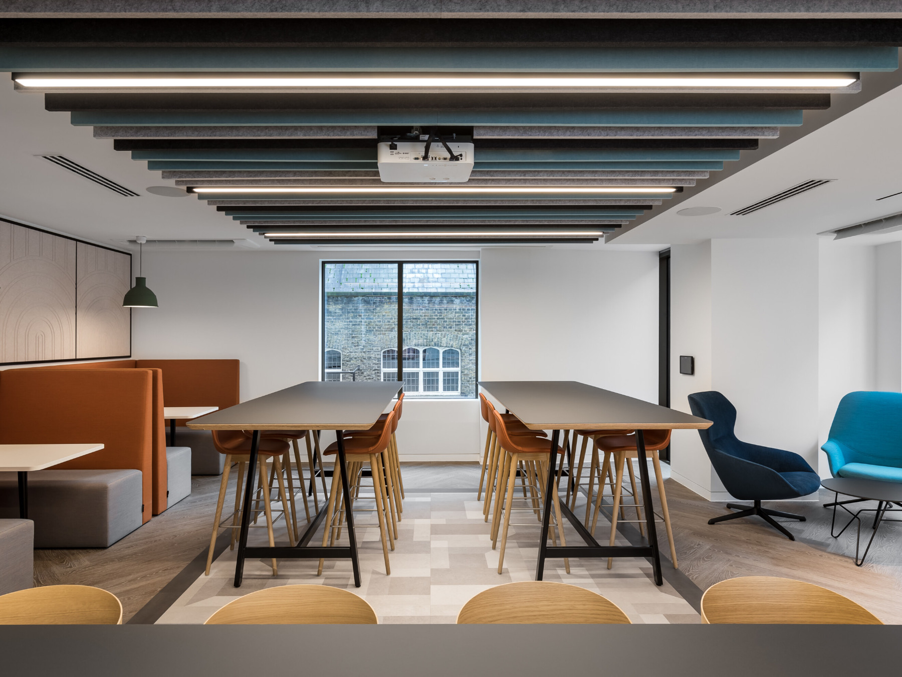 Modern meeting space with flexible seating for workshops and presentations.