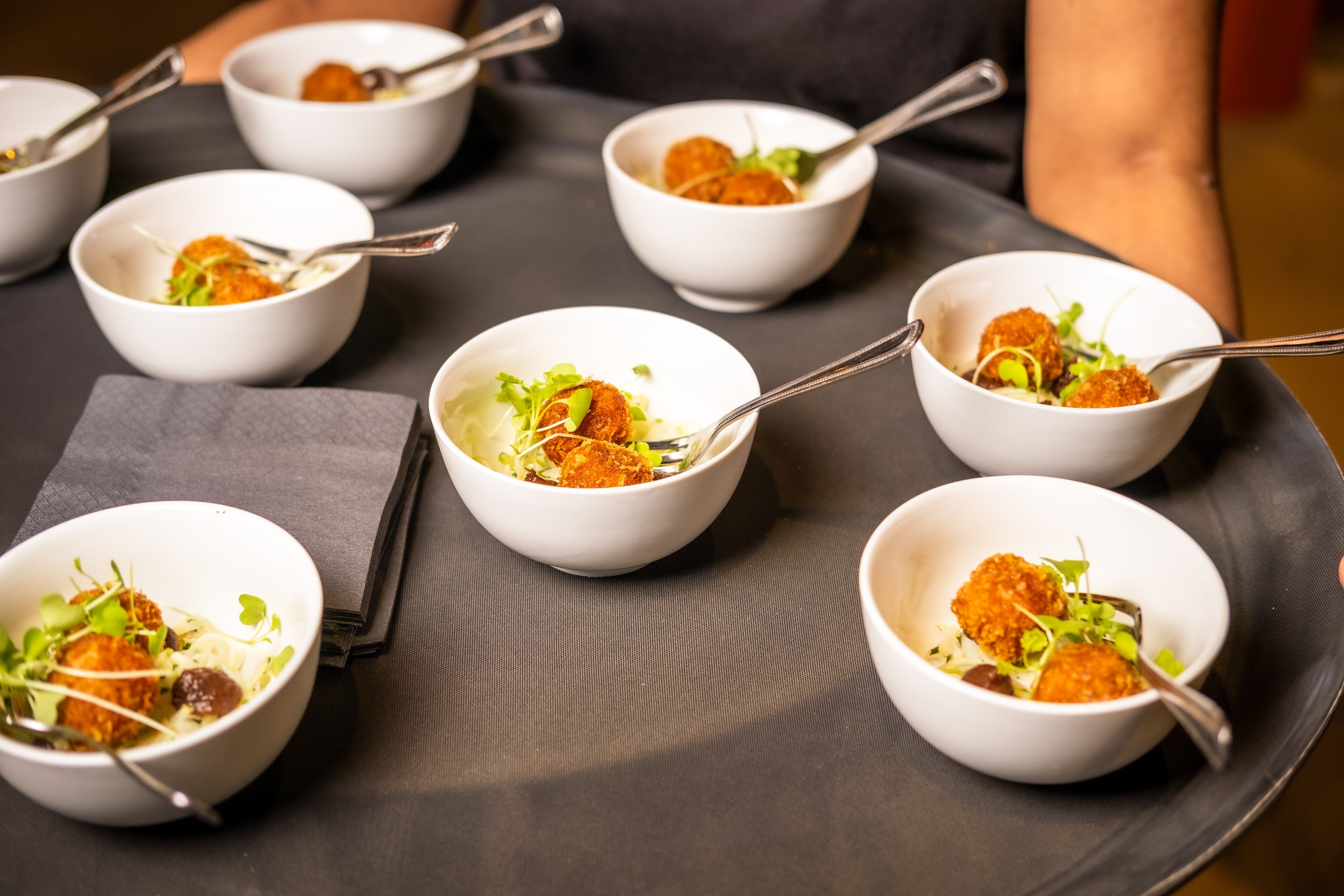 Stylish hors d'oeuvres tray for networking events and cocktail receptions.