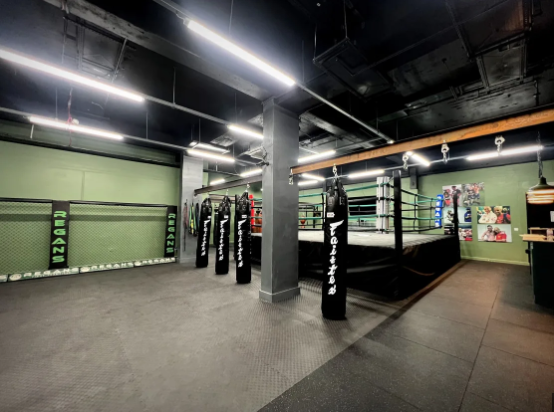Regans Courtyard: versatile event space with boxing ring for fitness and corporate events.