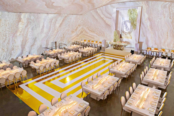 Elegant Mezzanine event space with marble walls, perfect for upscale dinners and corporate events.