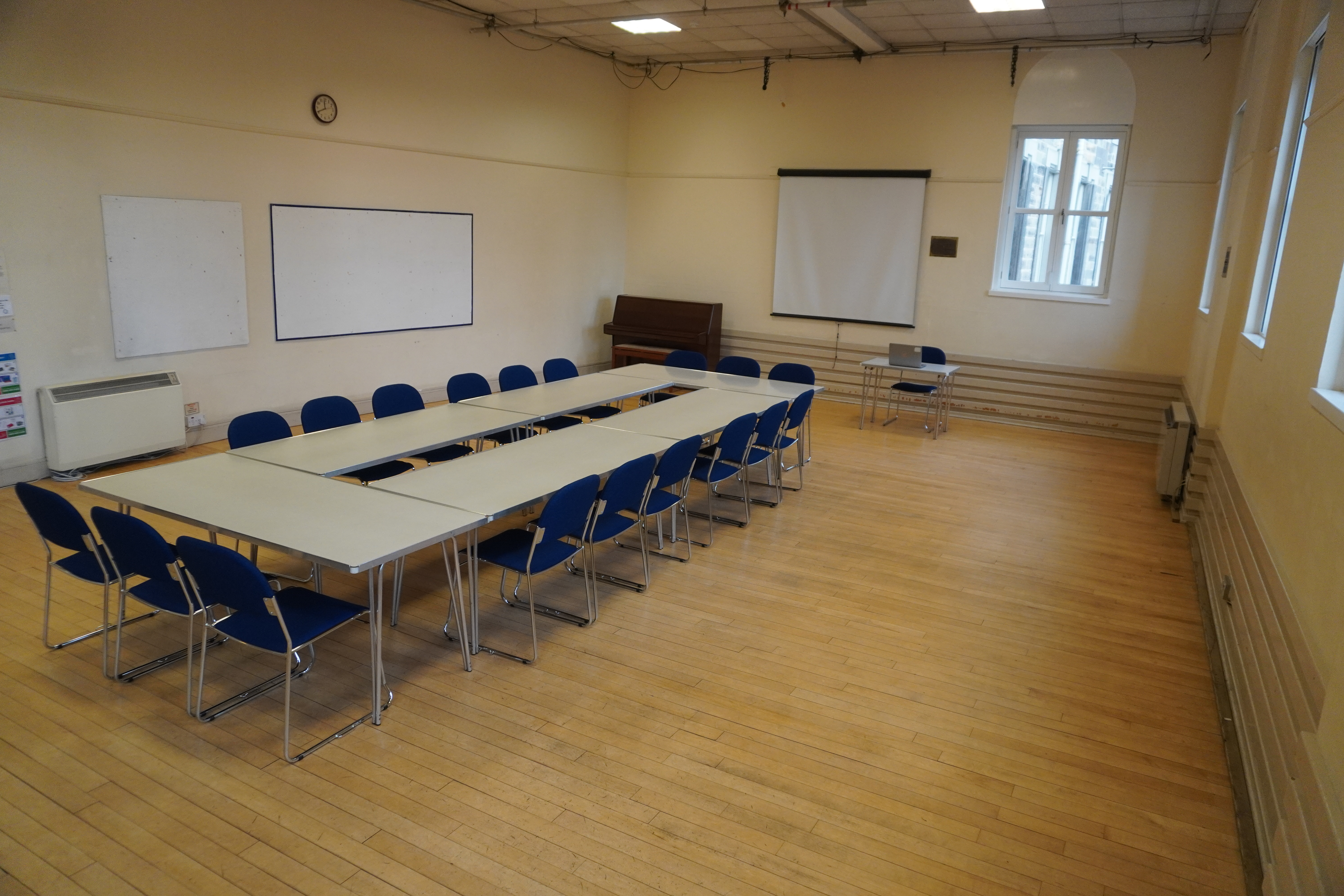 Versatile meeting room in Edinburgh Quaker Meeting House for workshops and discussions.