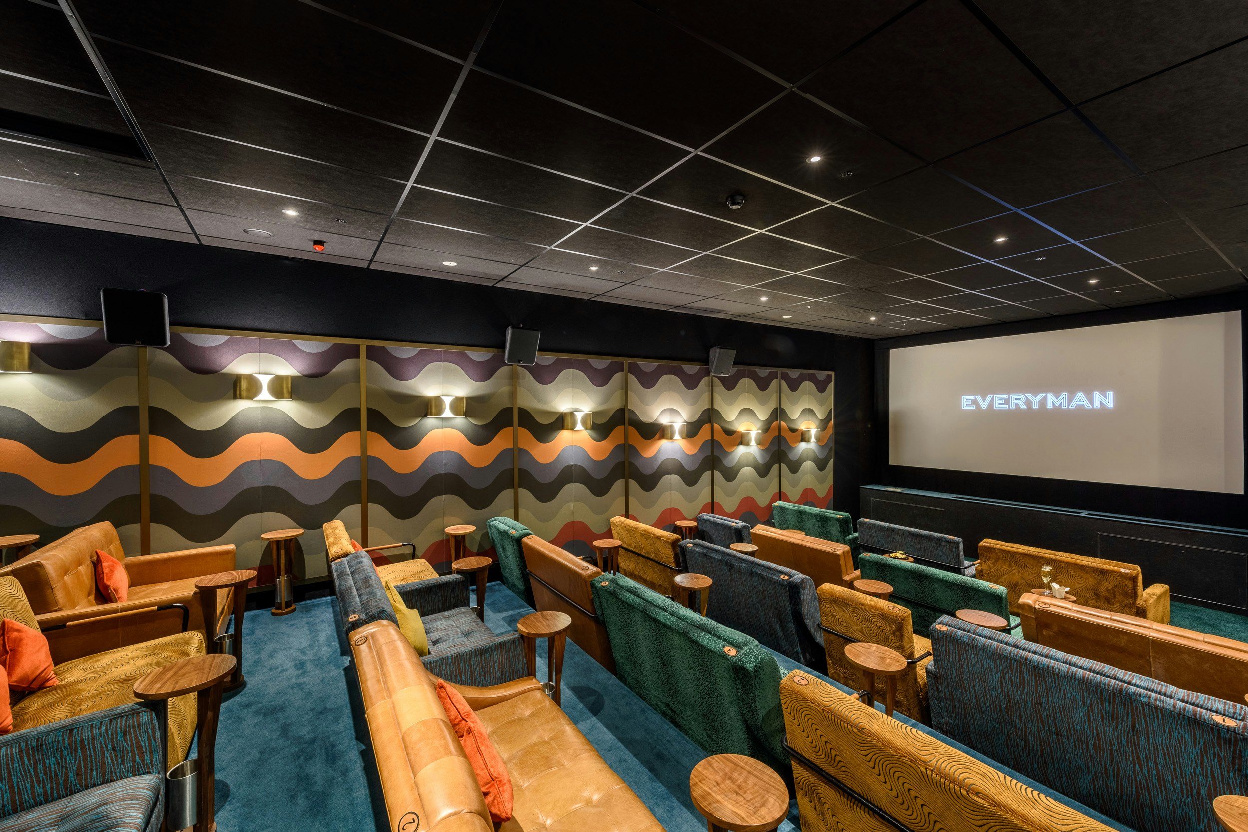 Stylish cinema bar with plush seating for private screenings and corporate events.