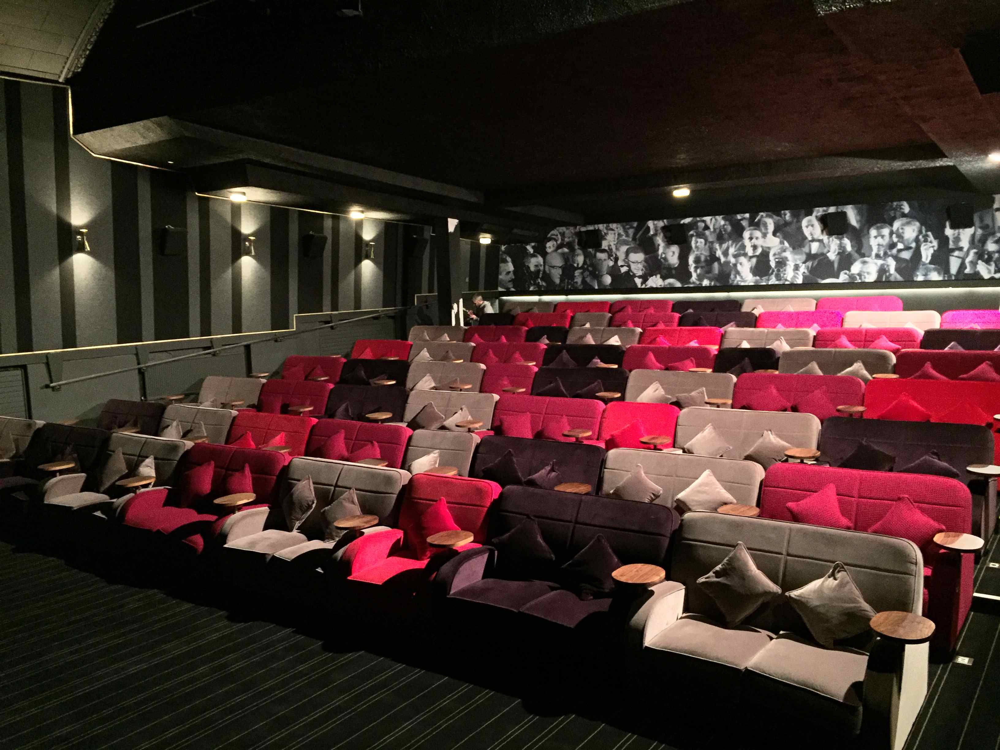 Stylish cinema seating at Statement Bar, ideal for film festivals and private events.
