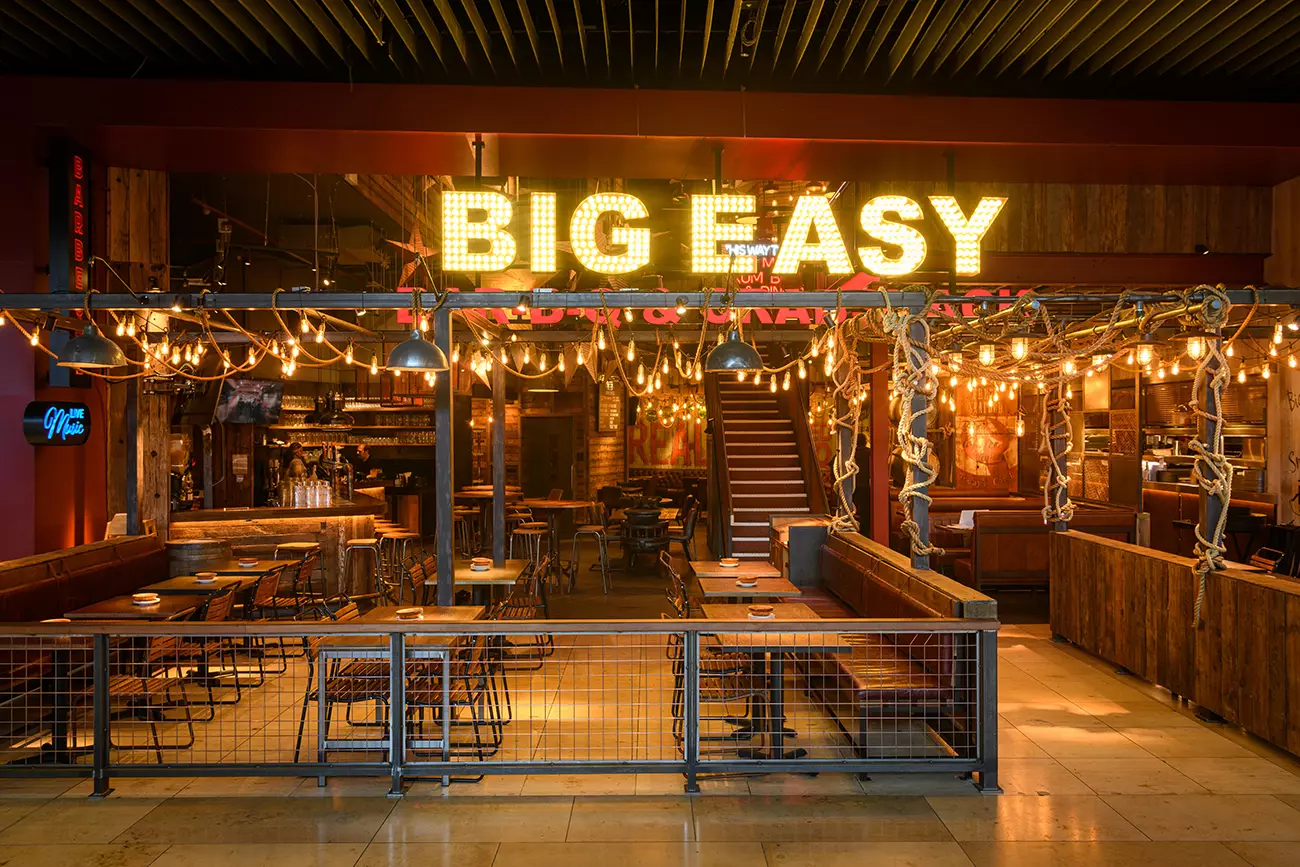 Big Easy venue in Canary Wharf, rustic design with warm lighting for events and receptions.
