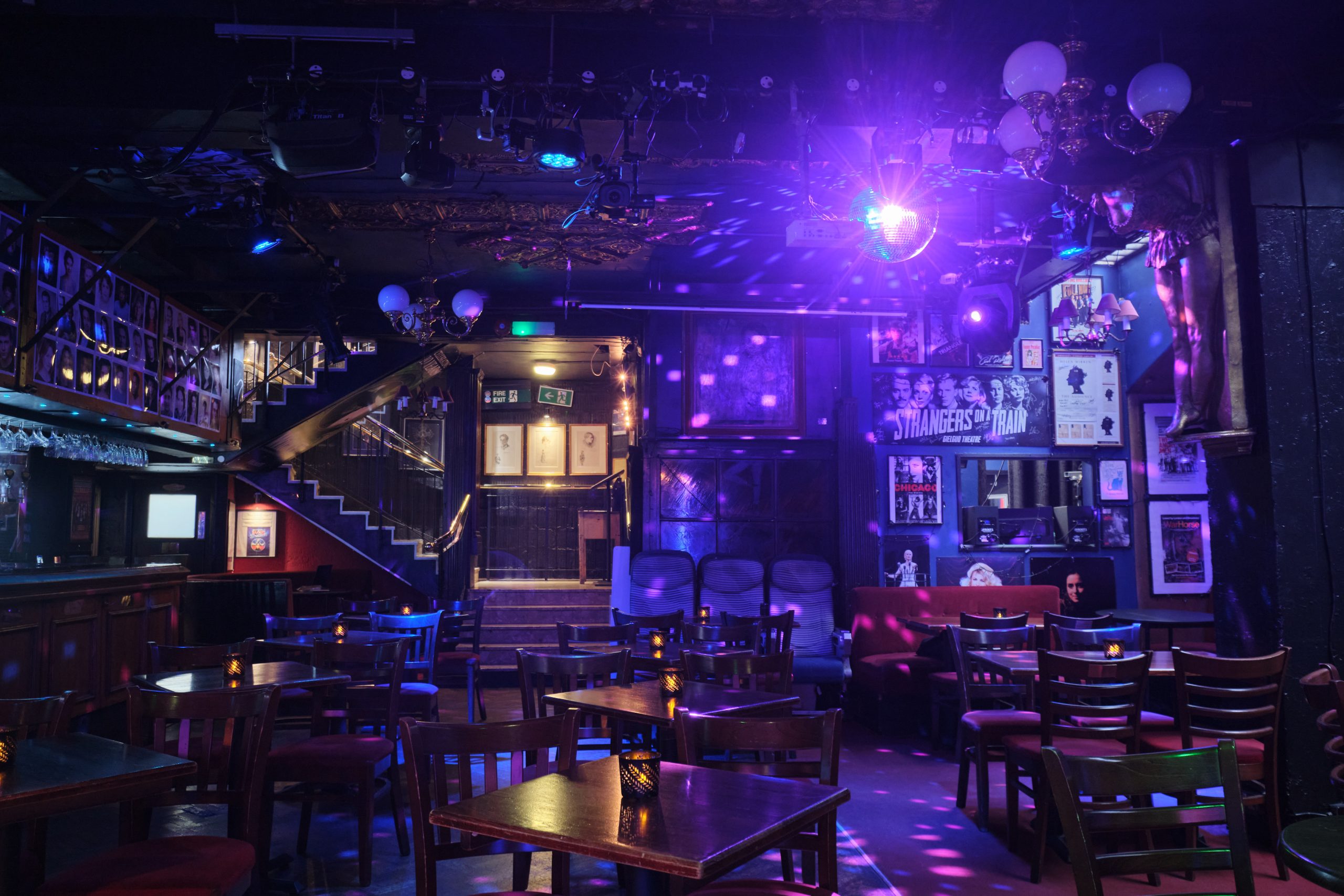 Vibrant Phoenix Arts Club event space with colorful lighting for performances and gatherings.