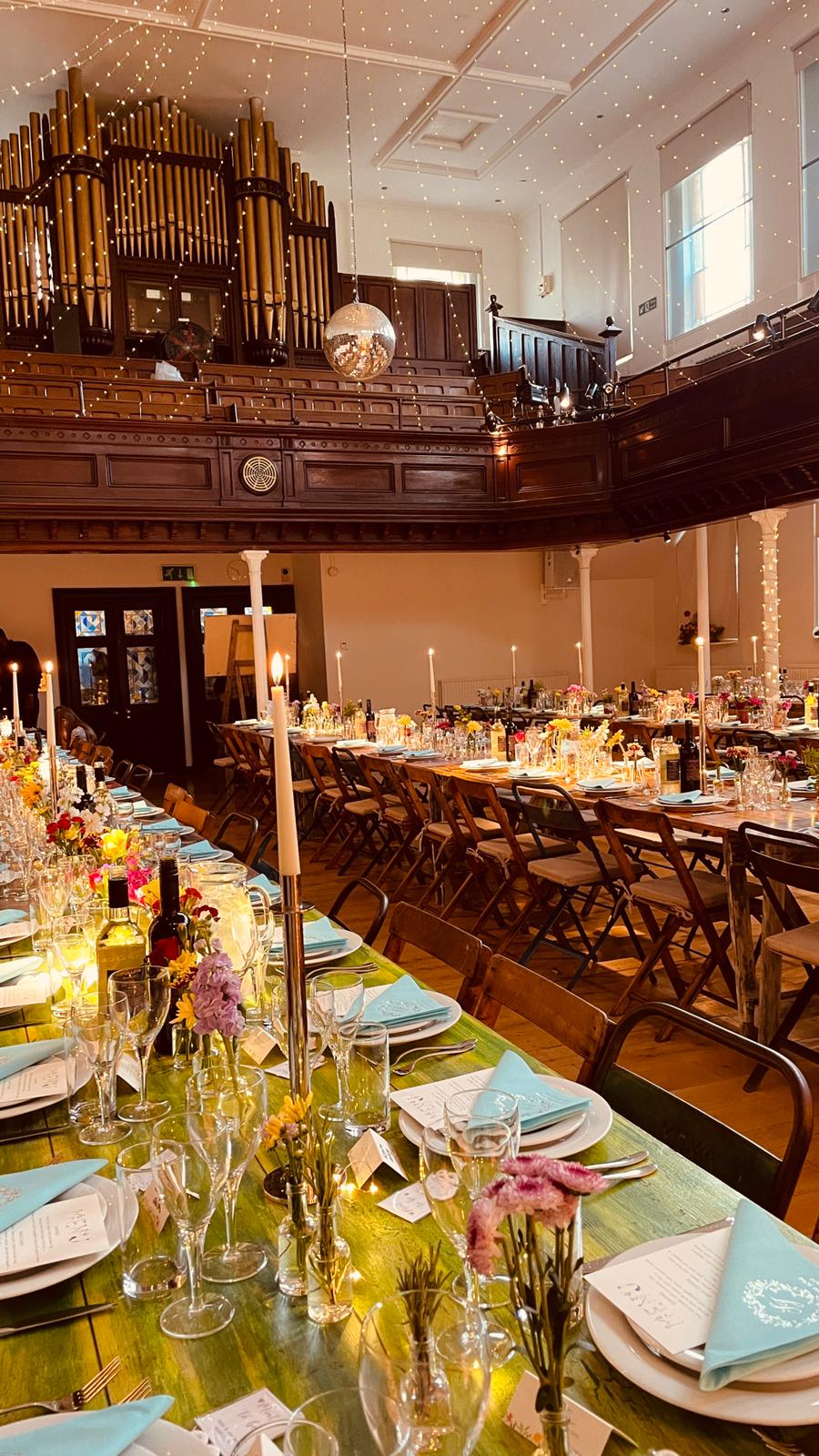 Elegant dining setup at The Amadeus for formal events with flowers and candles.
