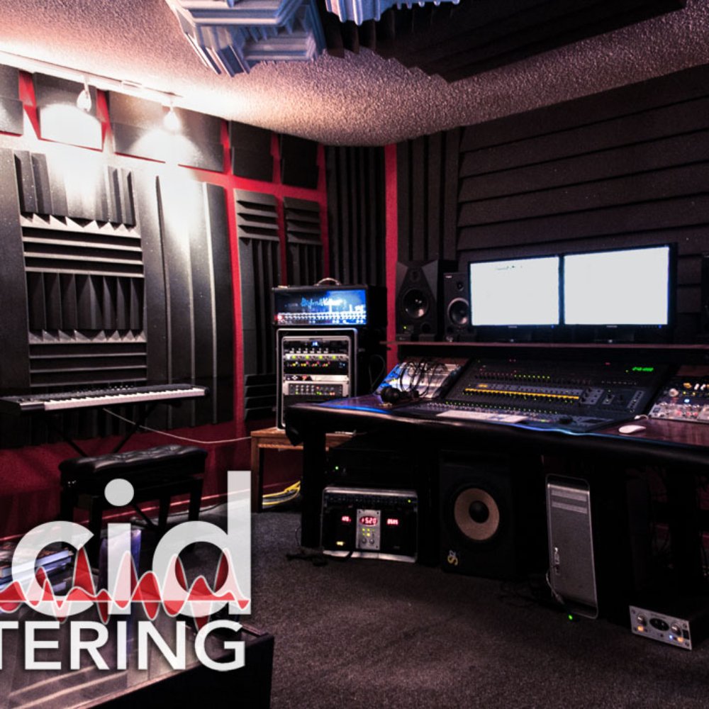 Professional audio recording studio with soundproofed walls for music production workshops.