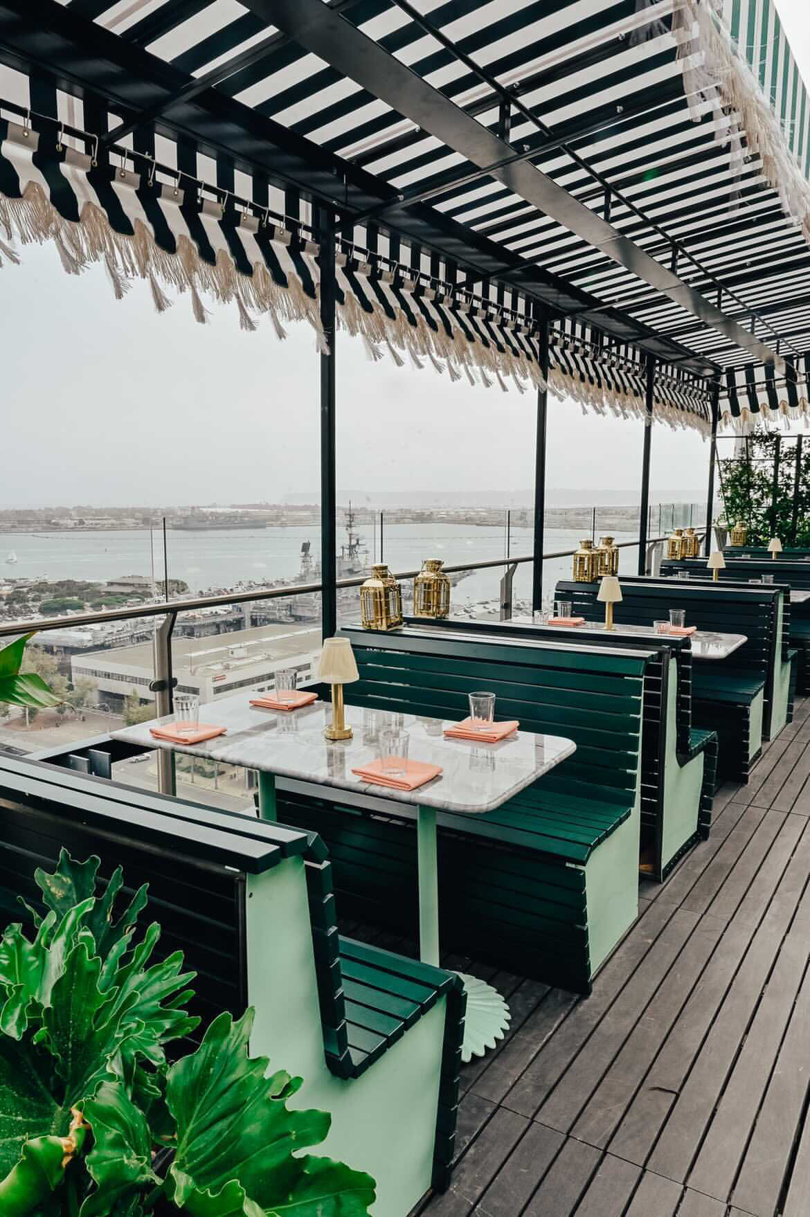 Stylish rooftop venue at Seneca Trattoria with panoramic water views for events.