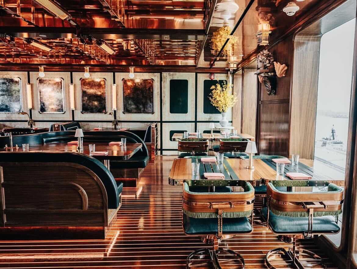 Stylish Seneca Trattoria interior with warm wood tones, ideal for corporate events and gatherings.