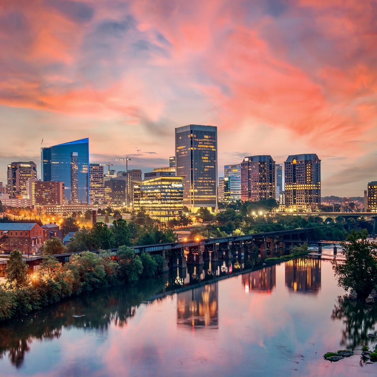 Vibrant city skyline at sunset, ideal for meetings and outdoor events.