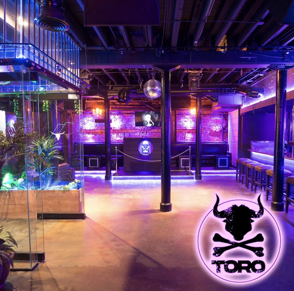 Vibrant TORO Nightclub with neon lights, ideal for corporate events and private parties.