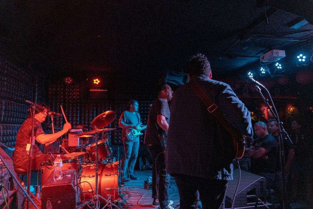 Live band performance in Casbah's vibrant music room, perfect for events and ambiance.