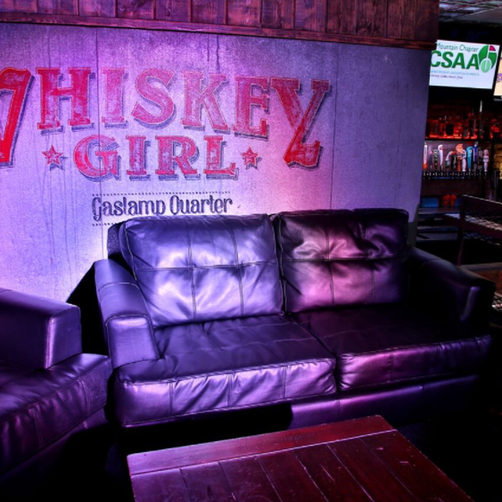 Enclosed Smoking Patio in Casbah with black leather couch for trendy events in Gaslamp Quarter.