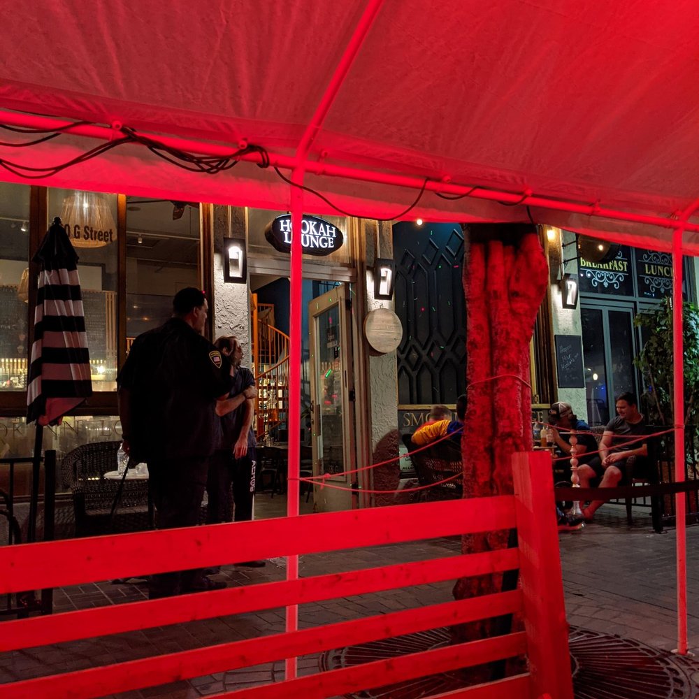 Enclosed smoking patio at Casbah, vibrant outdoor space for networking events.