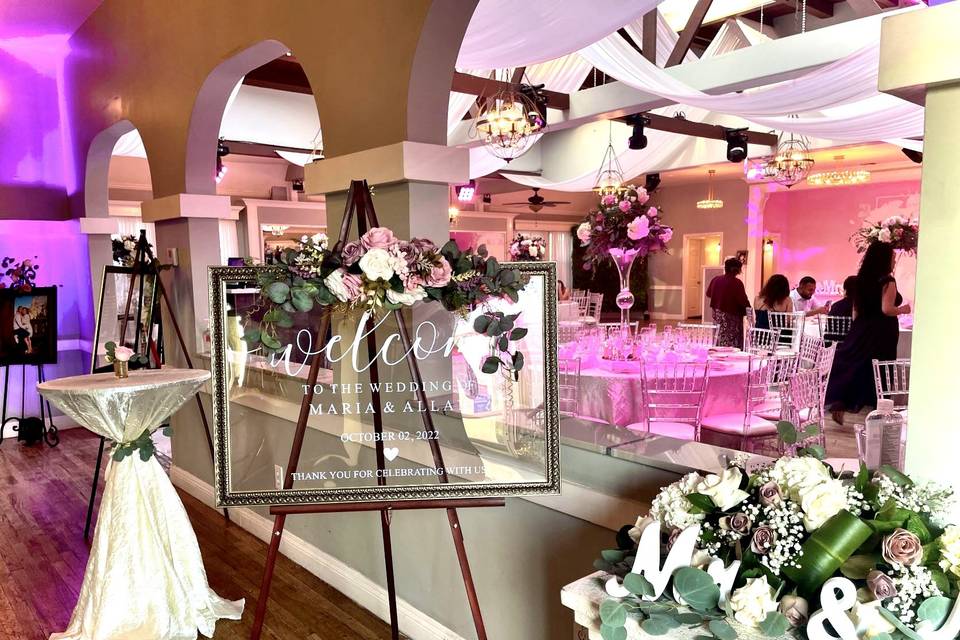 Elegant Atlantis Banquet Hall with floral decor for a romantic wedding event.