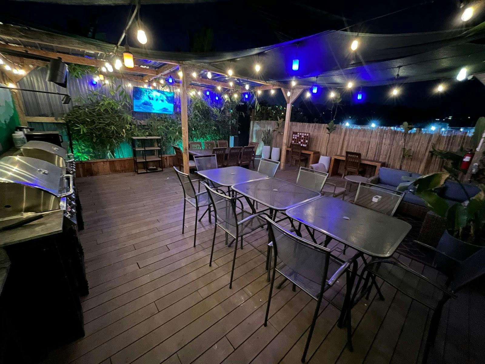 Outdoor event space at Good Life Resort with string lights, perfect for gatherings and networking.