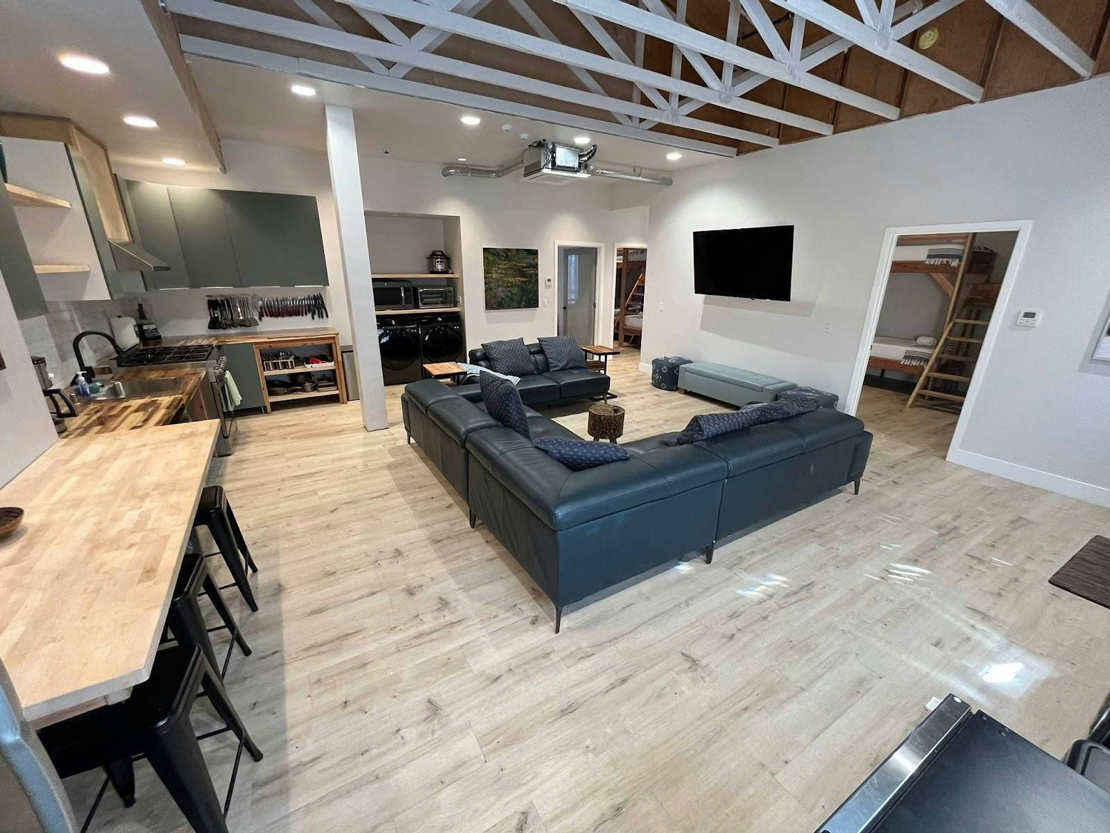 Modern meeting space with cozy seating at Good Life Vacation Rental Resort for workshops.