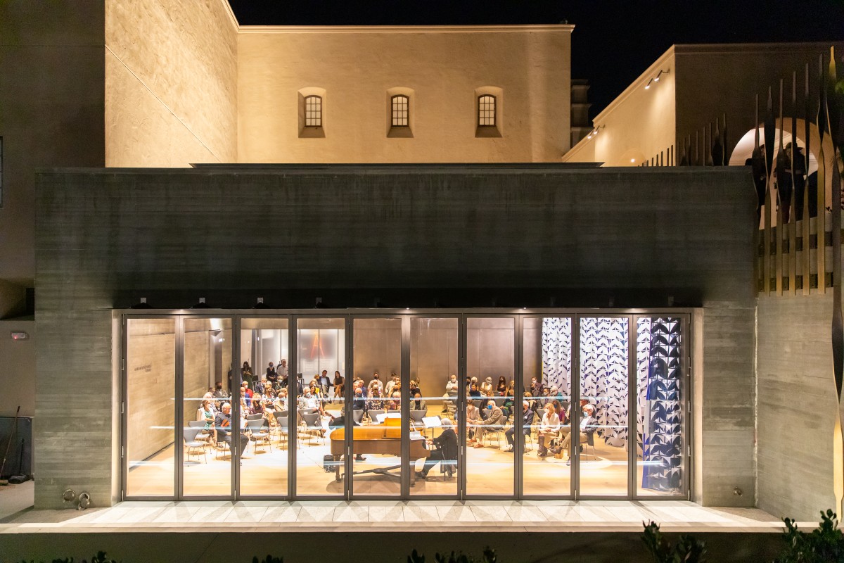 Mingei Museum event space with large glass windows, perfect for conferences and gatherings.