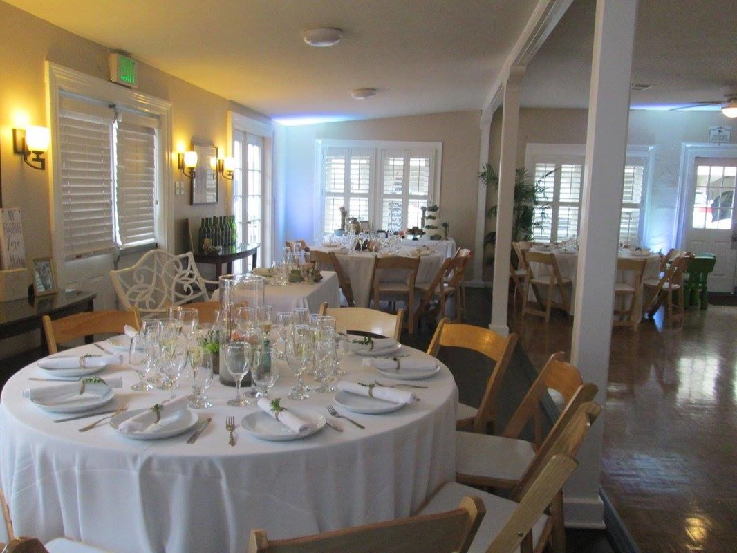 MBWC Clubhouse event space with elegantly set tables for gatherings and formal dinners.