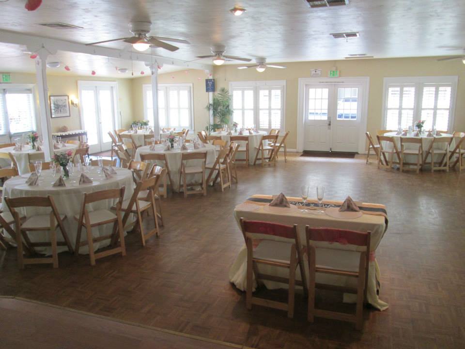 MBWC Clubhouse event space with elegant table settings, ideal for weddings and corporate events.