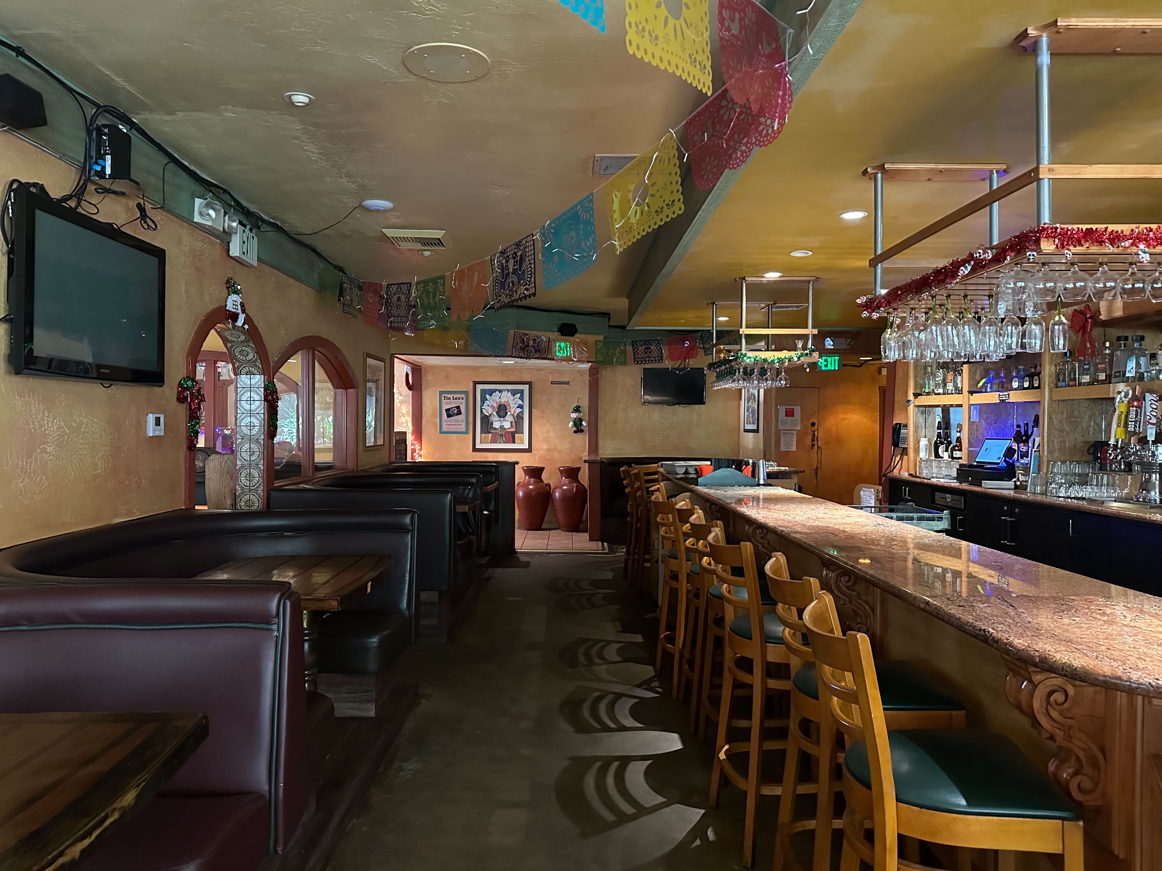 Cozy bar at Tio Leo's Mexican Restaurant, perfect for networking and casual events.