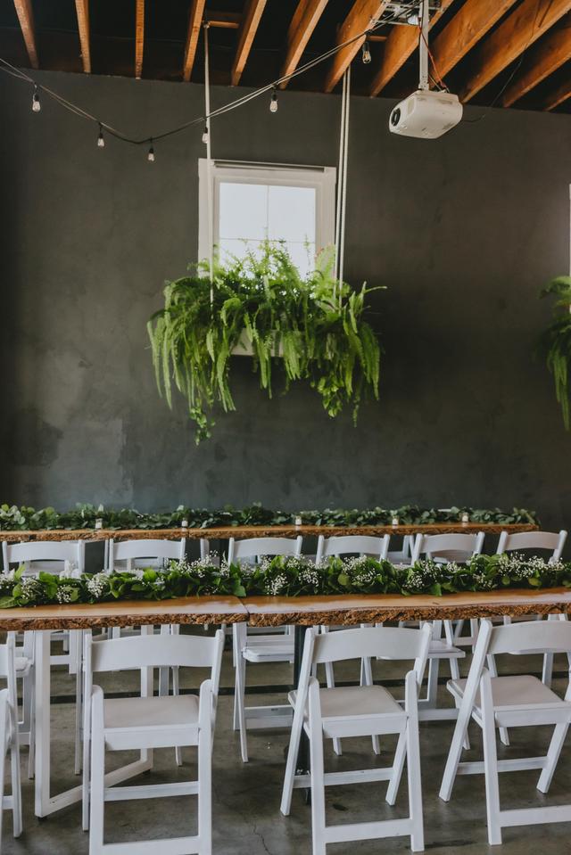 Cozy Corner event space with greenery, ideal for nature-inspired weddings and gatherings.