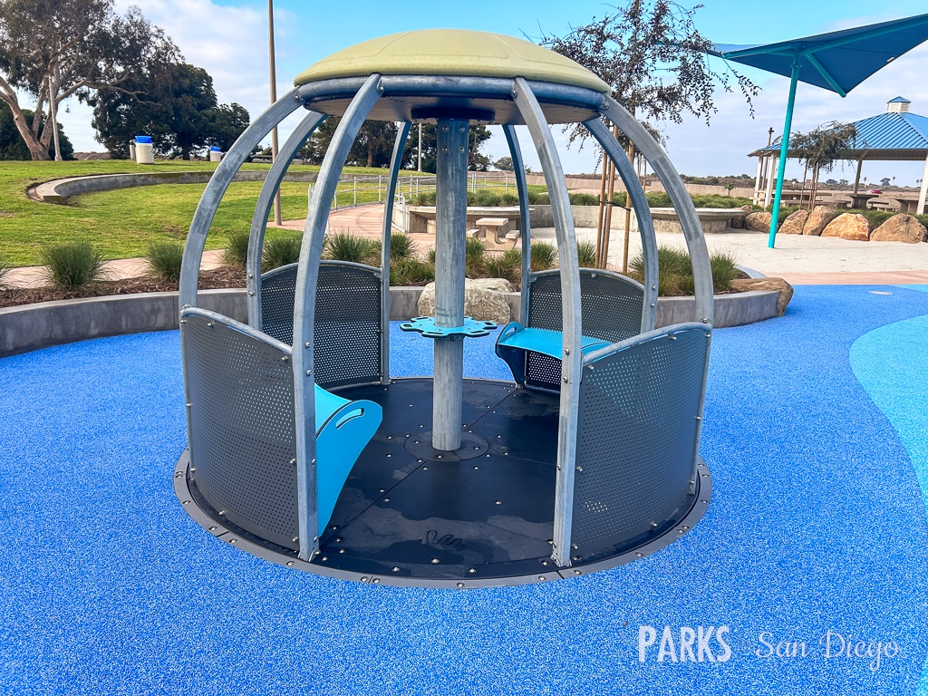 Modern circular seating in Tecolote Recreation Center's game room for team-building events.