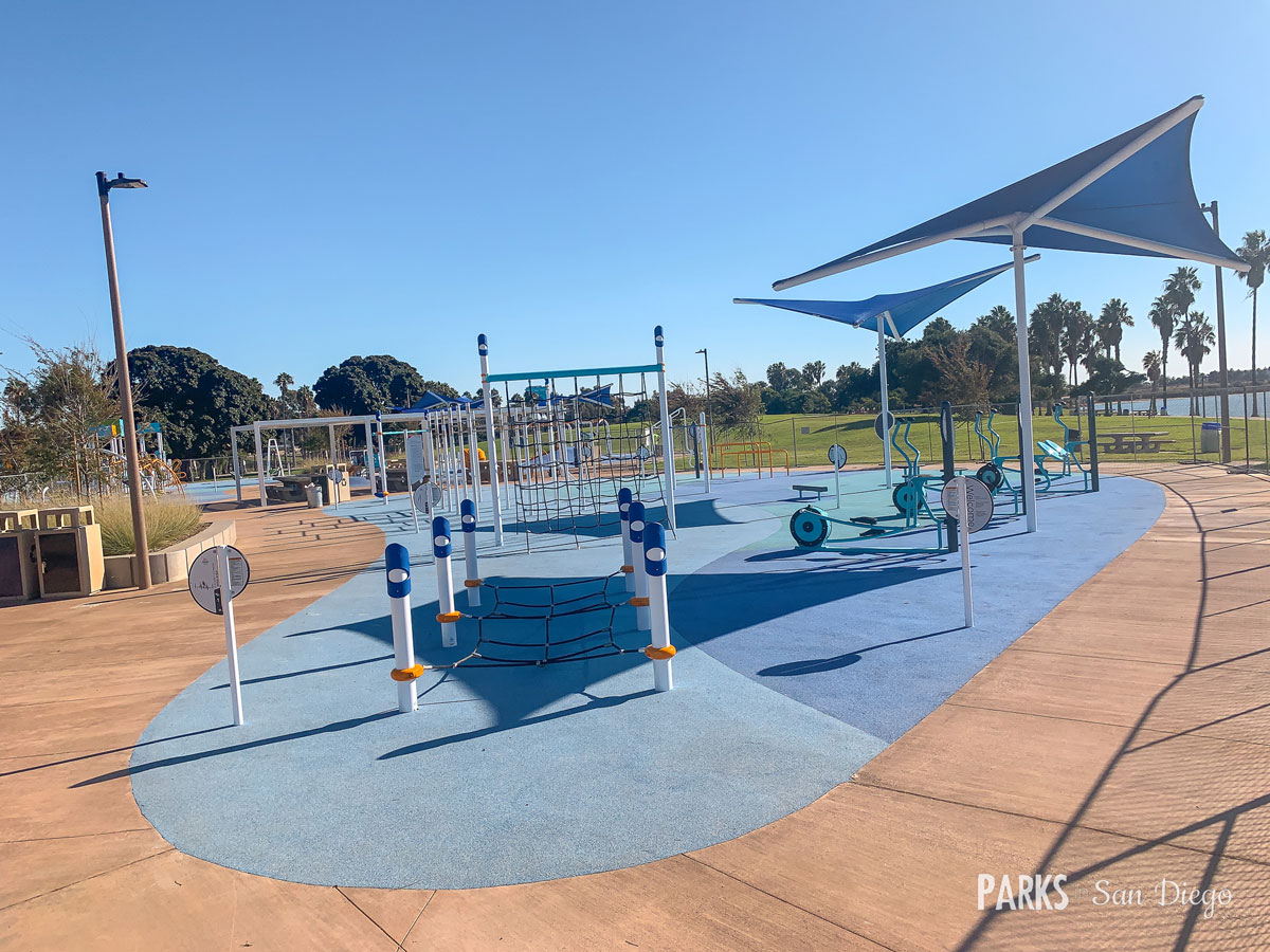 Vibrant outdoor fitness park at Tecolote Recreation Center for team-building events.