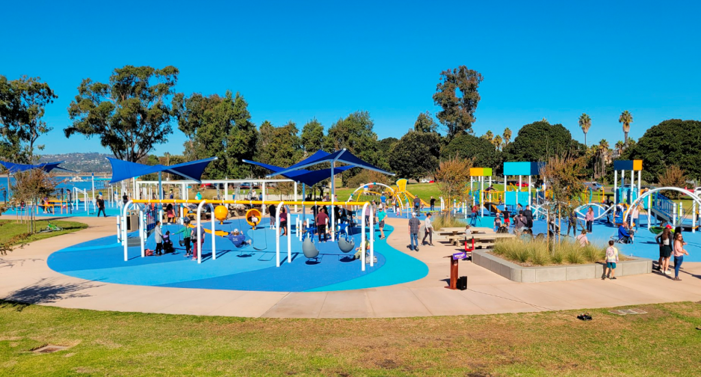 Vibrant outdoor playground at Tecolote Recreation Center for family events and gatherings.