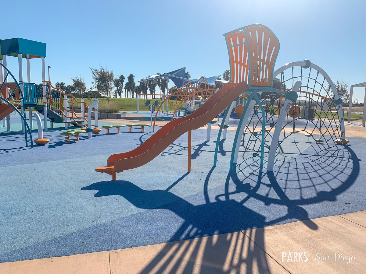 Colorful playground at Tecolote Recreation Center for family-friendly events and gatherings.