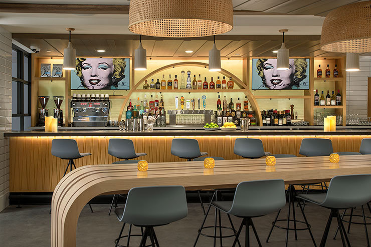 Modern bar at Westerly Public House with stylish seating for networking events.