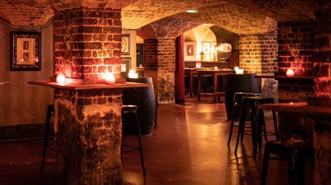 Charming underground venue with exposed brick for private events in Brixton.