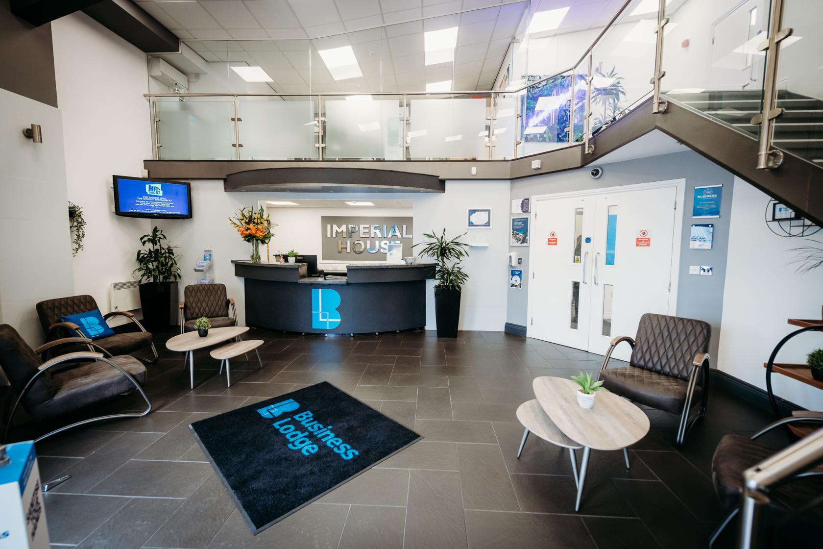 Modern meeting room reception with sleek design, ideal for events and networking.