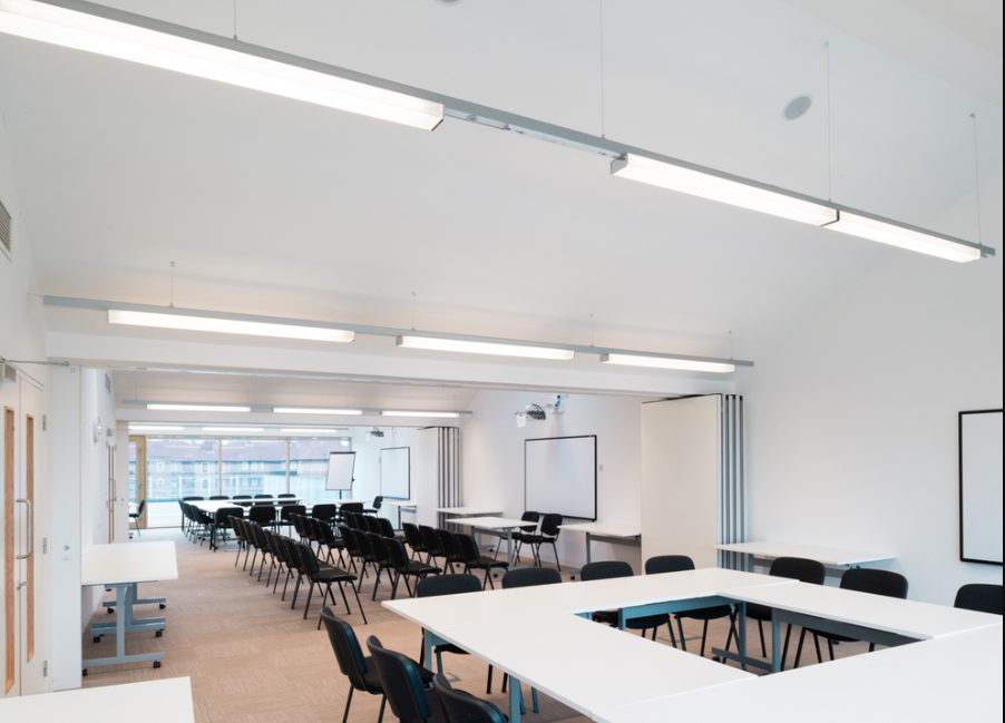 Conference room in The Foundry, versatile space with natural light for workshops and presentations.