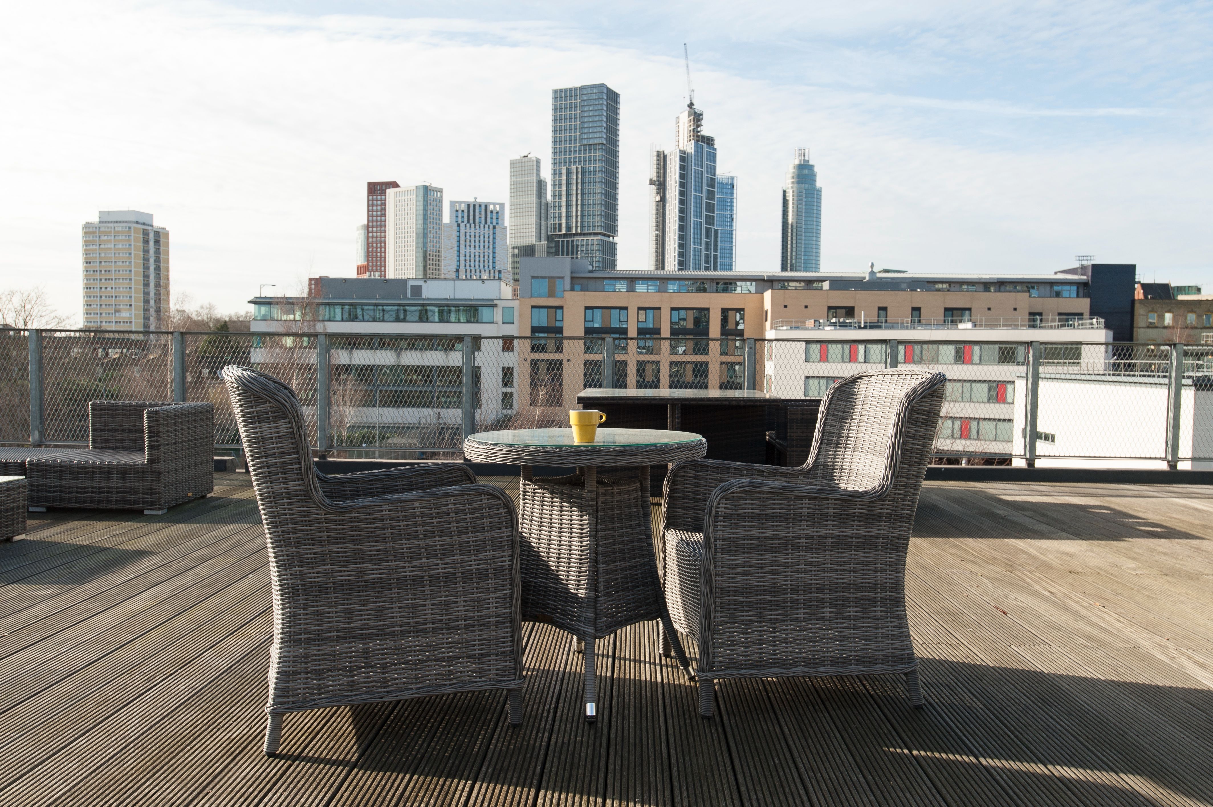 Stylish outdoor seating in Meeting Room 5, ideal for casual meetings and networking events.