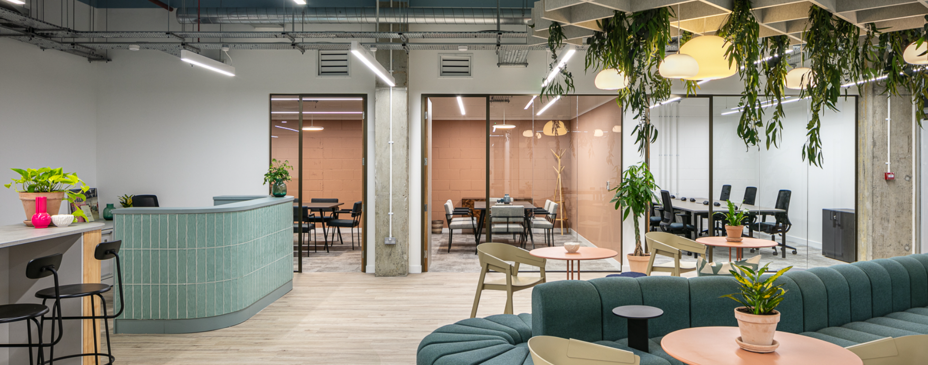 Modern meeting space in Fulham with glass-walled rooms for events and collaboration.