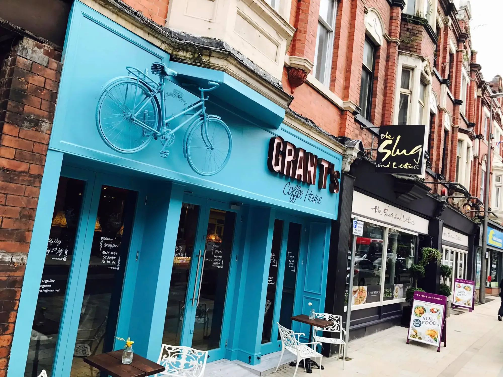 Vibrant blue café exterior at Gran T’s Coffee House, ideal for casual meetings and networking.